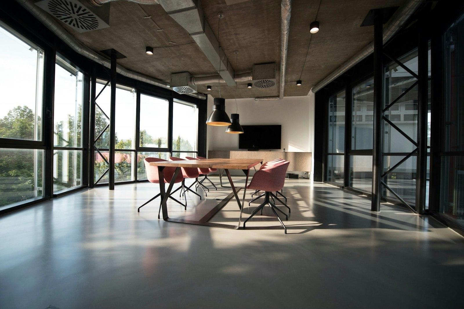 Corporate professionals collaborating in a modern glass office